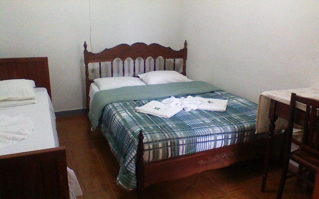 Novo Hotel Itajubá Quarto foto